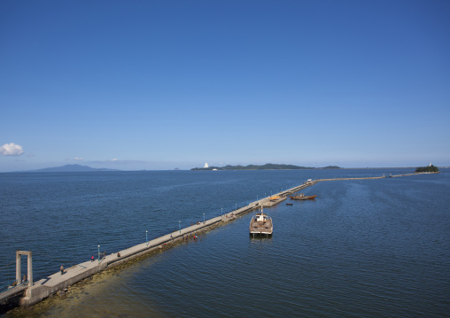 Old boats neat a jetty, Kangwon Province, Wonsan, North Korea