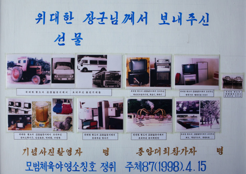 Propaganda billboard in Songdowon international children's camp depicting the gifts sent by Kim Jong-il, Kangwon Province, Wonsan, North Korea