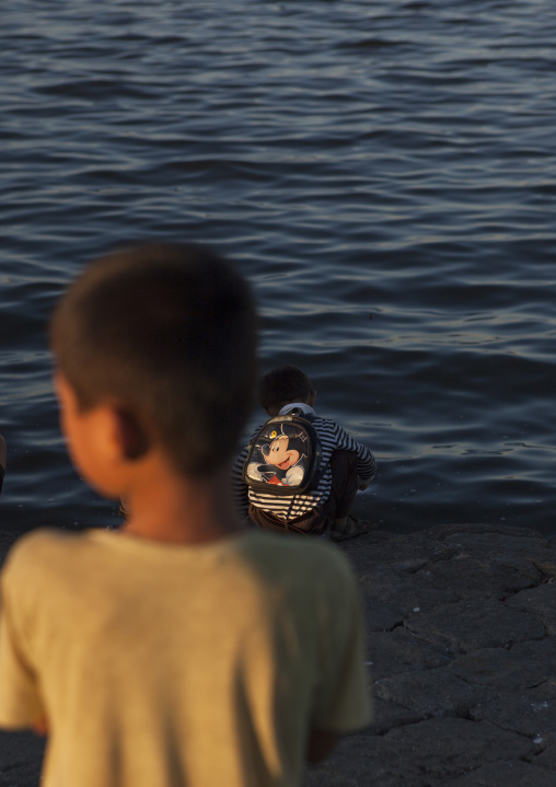 North Korean child boy fishing in the sea, Kangwon Province, Wonsan, North Korea