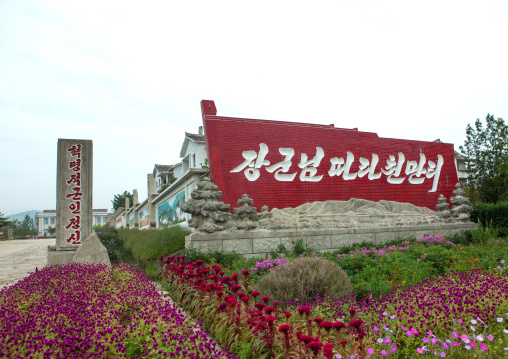 Propaganda billboard at the entrance of a village saying revolutionary military spirit, South Hamgyong Province, Hamhung, North Korea