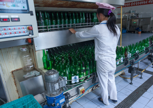 North Korean female worker in kangso yaksu mineral water factory, South Pyongan Province, Nampo, North Korea