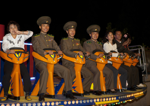 North Korean soldiers in a fairground attraction at Kaeson youth park, Pyongan Province, Pyongyang, North Korea