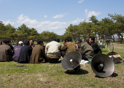 Child camp organizers with megaphones in the countryside, North Hamgyong Province, Chilbo Sea, North Korea