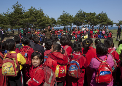 Young pioneers with Mickey mouse backpacks in a summer camp, North Hamgyong Province, Chilbo Sea, North Korea