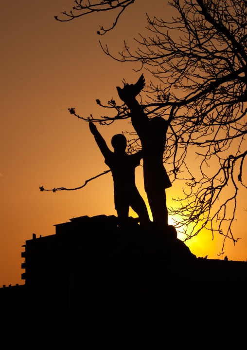 Statues of children and dove in the sunset in Tchang Gwang school kindergarden, North Hamgyong Province, Chongjin, North Korea