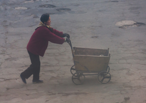 North Korean people pushing cart, North Hamgyong Province, Chongjin, North Korea