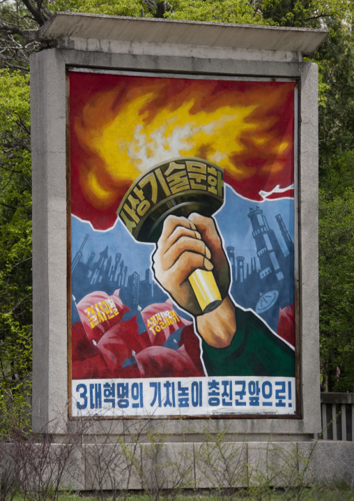 Propaganda billboard depicting the Juche tower flame, Pyongan Province, Pyongyang, North Korea