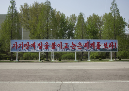 Propaganda slogan on a billboard in town, Pyongan Province, Pyongyang, North Korea
