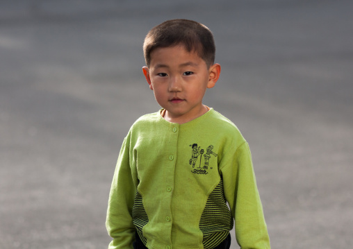 Portrait of a North Korean boy i the street, Pyongan Province, Pyongyang, North Korea
