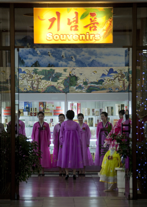 North Korean saleswomen in choson-ot in a shop, Pyongan Province, Pyongyang, North Korea