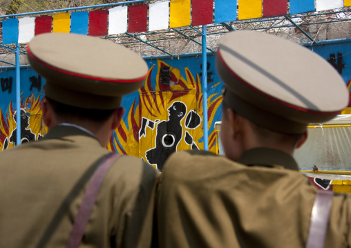 North Korean soldiers shooting at Taesongsan funfair, Pyongan Province, Pyongyang, North Korea