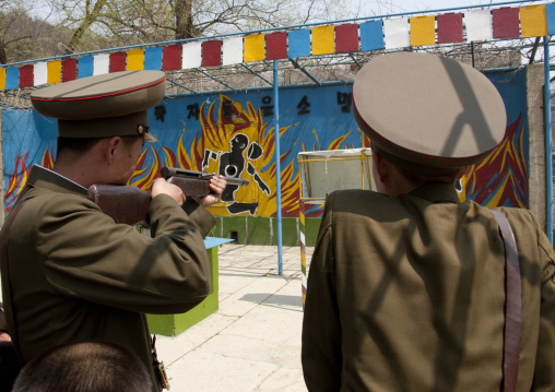 North Korean soldiers shooting at Taesongsan funfair, Pyongan Province, Pyongyang, North Korea