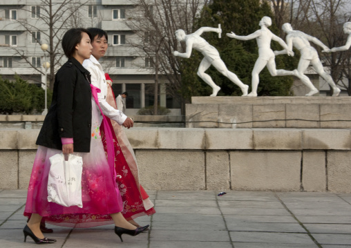 North Korean women walking in the street, Pyongan Province, Pyongyang, North Korea