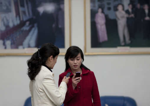 North Korean women using their mobiles phones, Pyongan Province, Pyongyang, North Korea