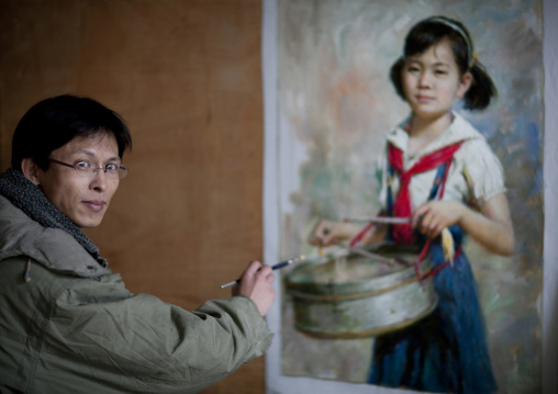 North Korean state artist painting a pioneer girl with a drum, Pyongan Province, Pyongyang, North Korea