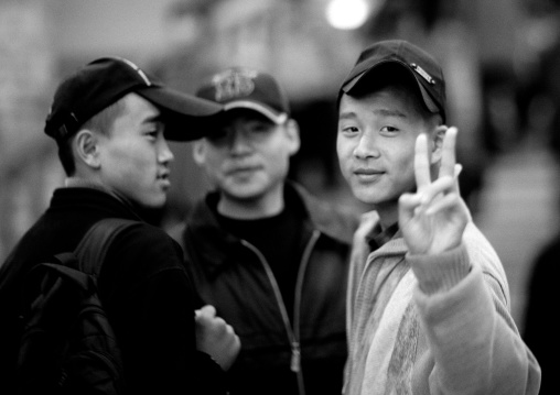 North Korean teenage boys wearing caps in a subway station, Pyongan Province, Pyongyang, North Korea