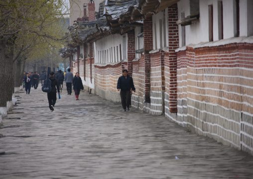 North Korean people walking in a street of the old town, North Hwanghae Province, Kaesong, North Korea
