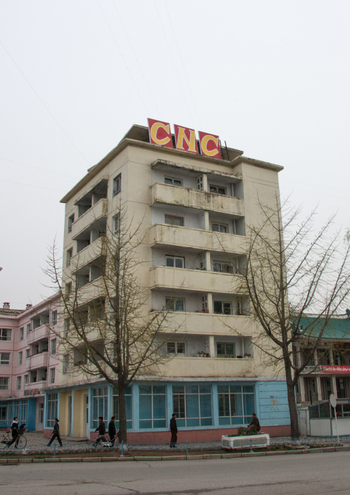 Propaganda billboard promoting computer numerical control campaign at the top of a building, North Hwanghae Province, Kaesong, North Korea