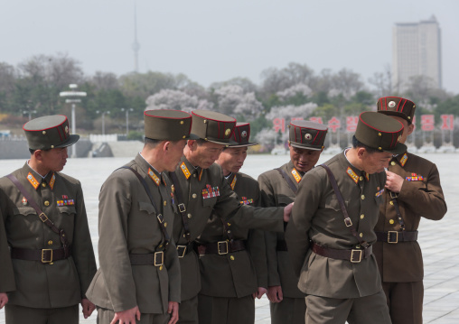 North Korean soldiers posing for a photo in Kumsusan memorial palace, Pyongan Province, Pyongyang, North Korea