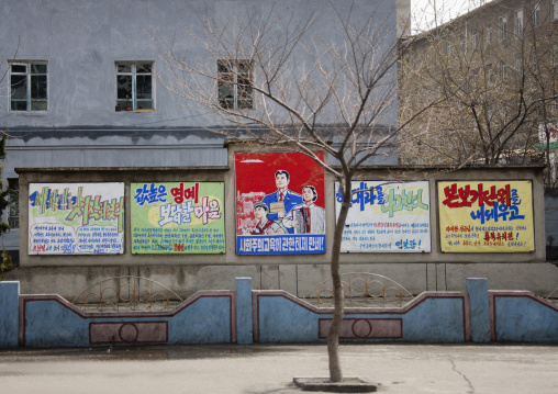 Row of North Korean propaganda billboards in the street, Pyongan Province, Pyongyang, North Korea