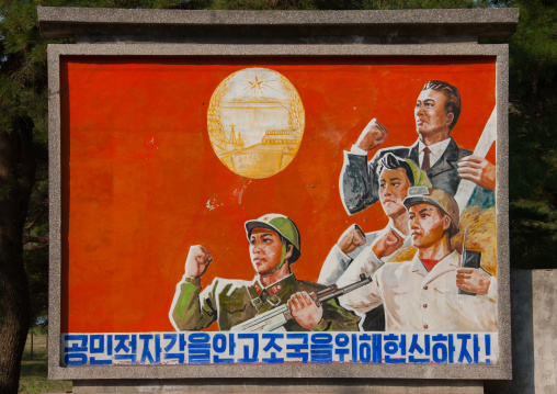 North Korean propaganda billboard saying by having civic conscience let us devote ourselves to the fatherland!, Kangwon Province, Wonsan, North Korea