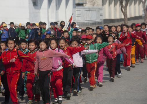 North Korean children parading in the streets on the international workers' day, Kangwon Province, Wonsan, North Korea