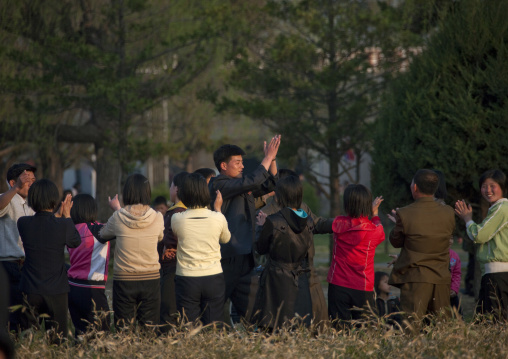 North Korean young people dancing in a park, Kangwon Province, Wonsan, North Korea
