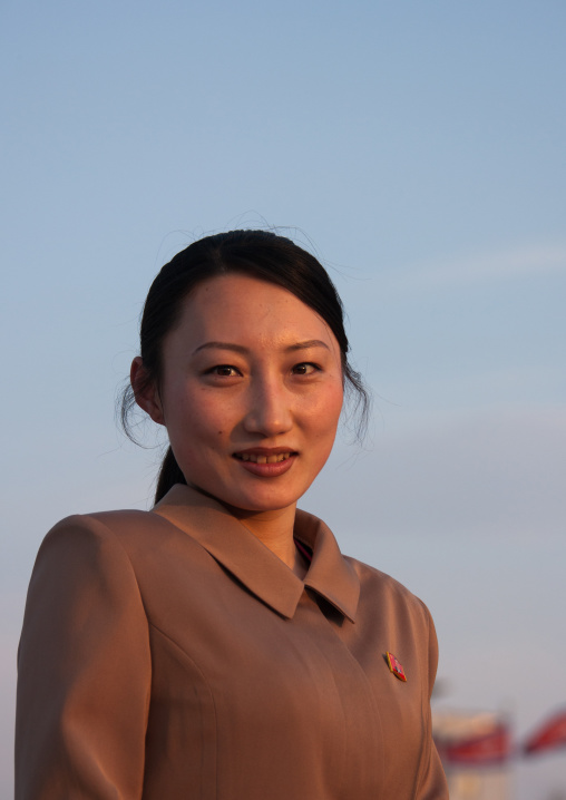 Portrait of a smiling North Korean woman in the street, Kangwon Province, Wonsan, North Korea