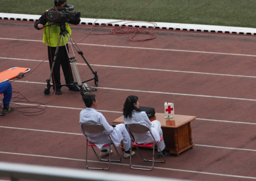 Medical staff in Kim il Sung stadium during a football game, Pyongan Province, Pyongyang, North Korea