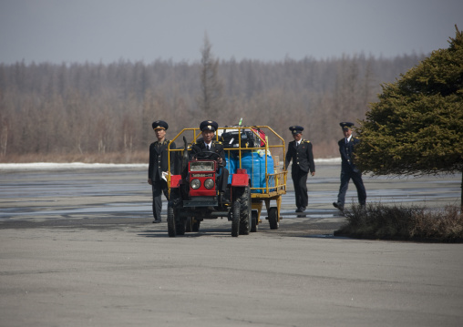 Bagage handlers in Samjiyon airport, Ryanggang Province, Samjiyon, North Korea
