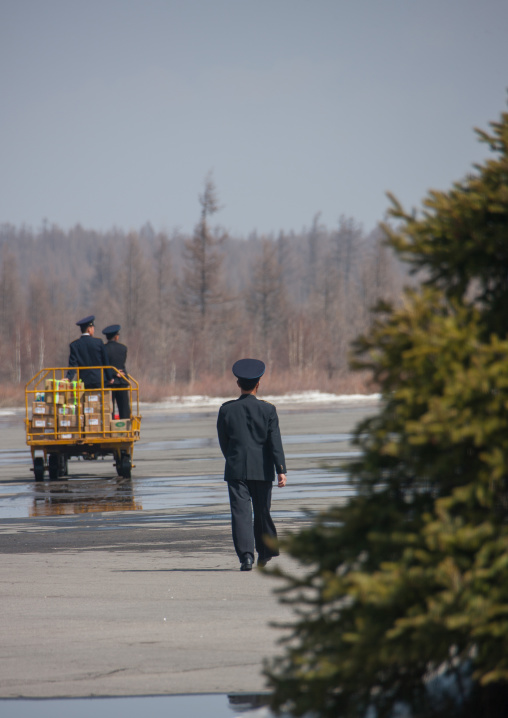 Bagage handlers in Samjiyon airport, Ryanggang Province, Samjiyon, North Korea