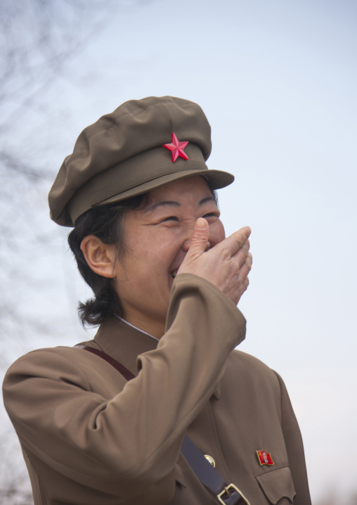 Laughing North Korean guide in mount Paektu laughing, Ryanggang Province, Samjiyon, North Korea