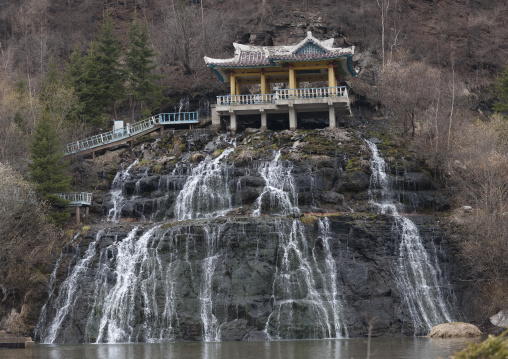 Pavillon over rimyonsu waterfalls in autumn, Ryanggang Province, Samjiyon, North Korea