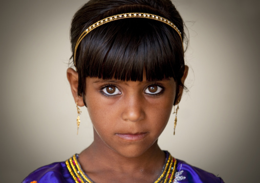 Portrait Of A Brown Eyes Bedouin Girl With Golden Hairpin, Sinaw, Oman