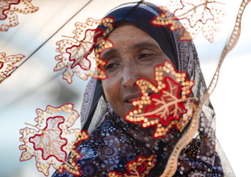 Old Woman Behind The Flower Gauze, Sinaw, Oman
