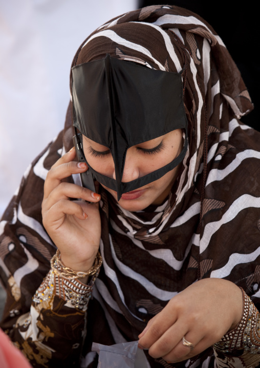 Bedouin Masked Woman Talking With Mobile Phone, Sinaw, Oman
