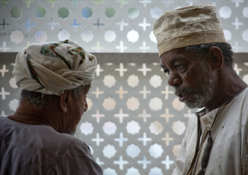 Two Fishermen Talking In Market, Muscat, Oman