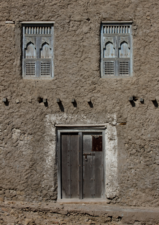 Facade Of A Traditional House With Wooden Windows And Doors, Mirbat, Oman