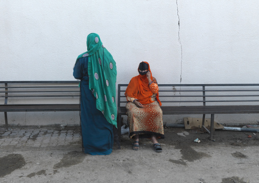 Two Bedouine Women Talking Through Mobile Phone, Ibra, Oman