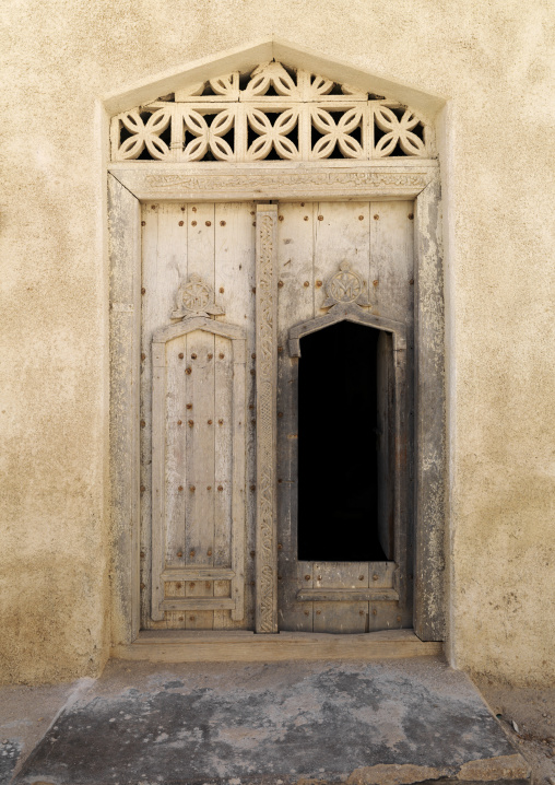 Wooden Door Carved In Arabic Style Of Old Dhofari House In Taqa, Oman