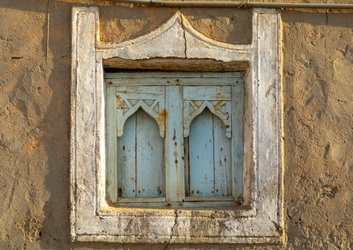 Wooden carved window of an abandoned house, Dhofar Governorate, Mirbat, Oman