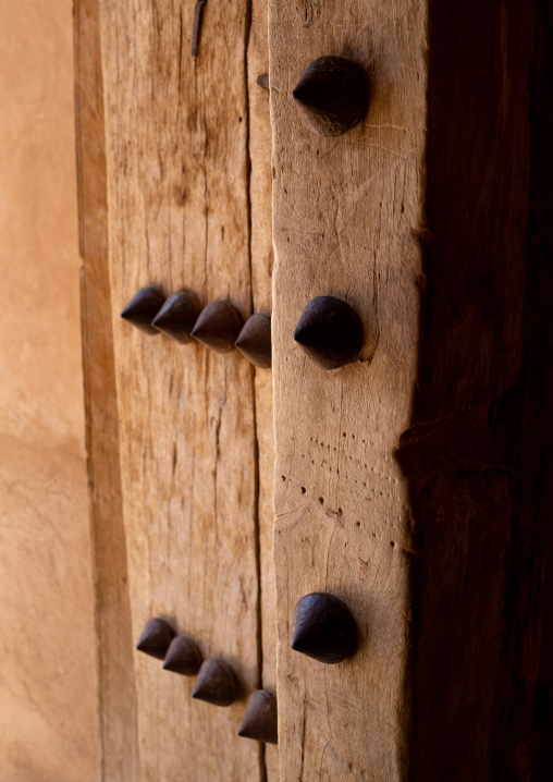 Omani wooden carved door in jabreen castle, Ad Dakhiliyah Region, Jabreen, Oman