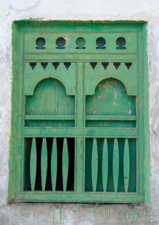 Wooden carved window of an abandoned house, Dhofar Governorate, Mirbat, Oman