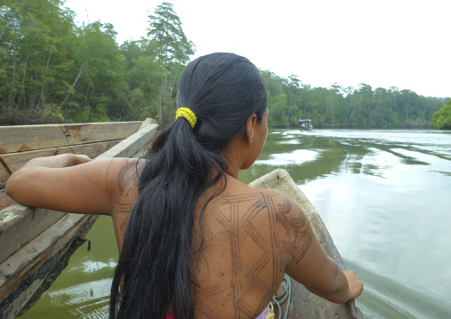 Panama, Darien Province, Puerta Lara, Wounaan Tribe Woman Going To Fish In A Canoe