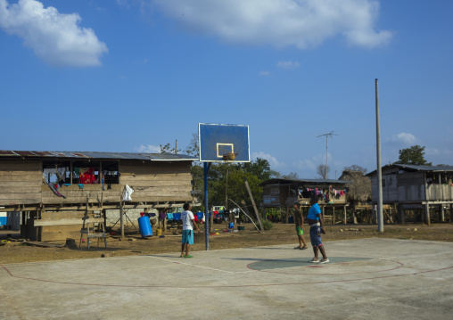 Panama, Darien Province, Alto Playona, Teenagers Playing On A Basketball Playground In An Embera Tribe Village