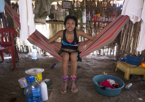 Panama, San Blas Islands, Mamitupu, Portrait Of A Cute Kuna Tribe Woman In Her Hammock