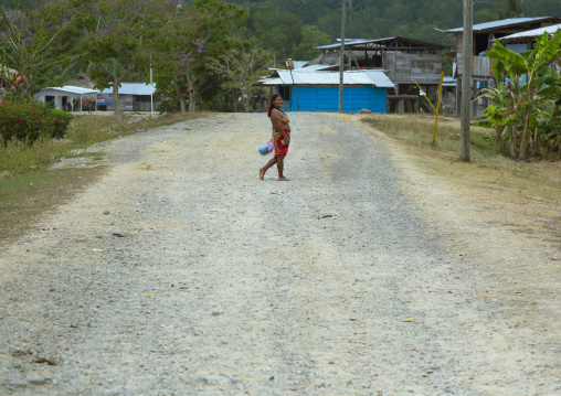 Panama, Darien Province, Puerta Lara, Wounaan Tribe Woman In The Middle Of A Road In A Village