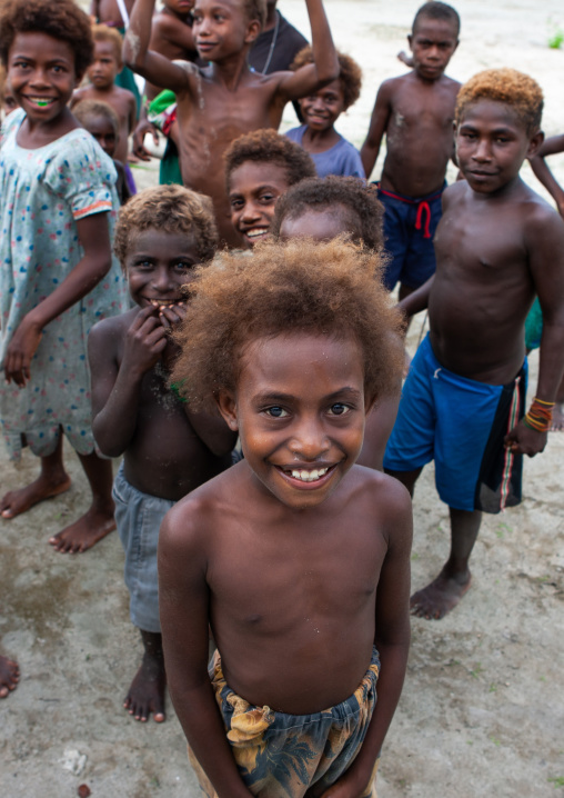 Portrait of children with blonde hair, New Ireland Province, Langania, Papua New Guinea