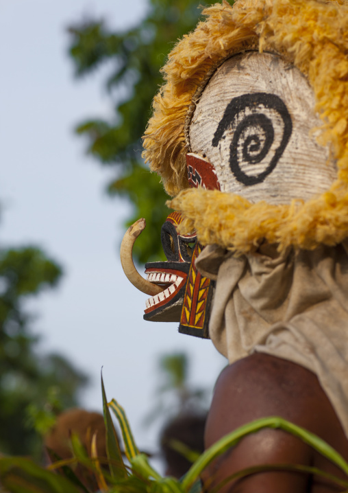 Malagan tatuana masks dance during a funeral ceremony, New Ireland Province, Langania, Papua New Guinea