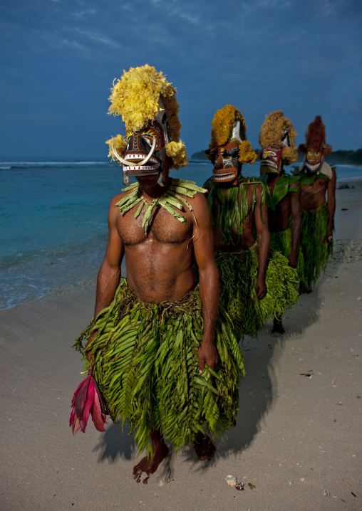 Malagan tatuana masks on a beach, New Ireland Province, Langania, Papua New Guinea